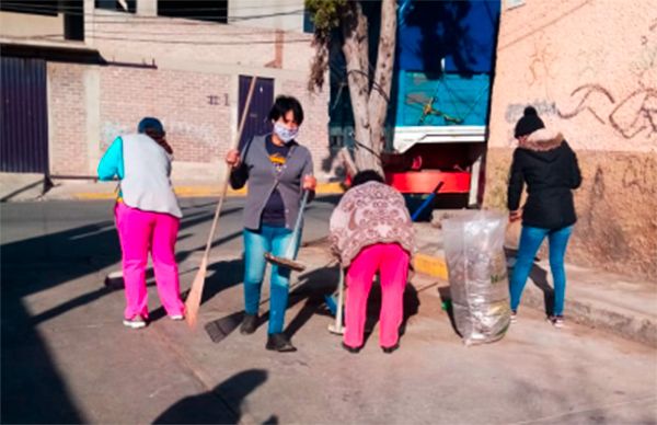 Antorchistas realizan pinta de guarniciones en Ixtapaluca