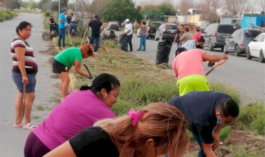 Vecinos de Reynosa realizan limpieza de su colonia